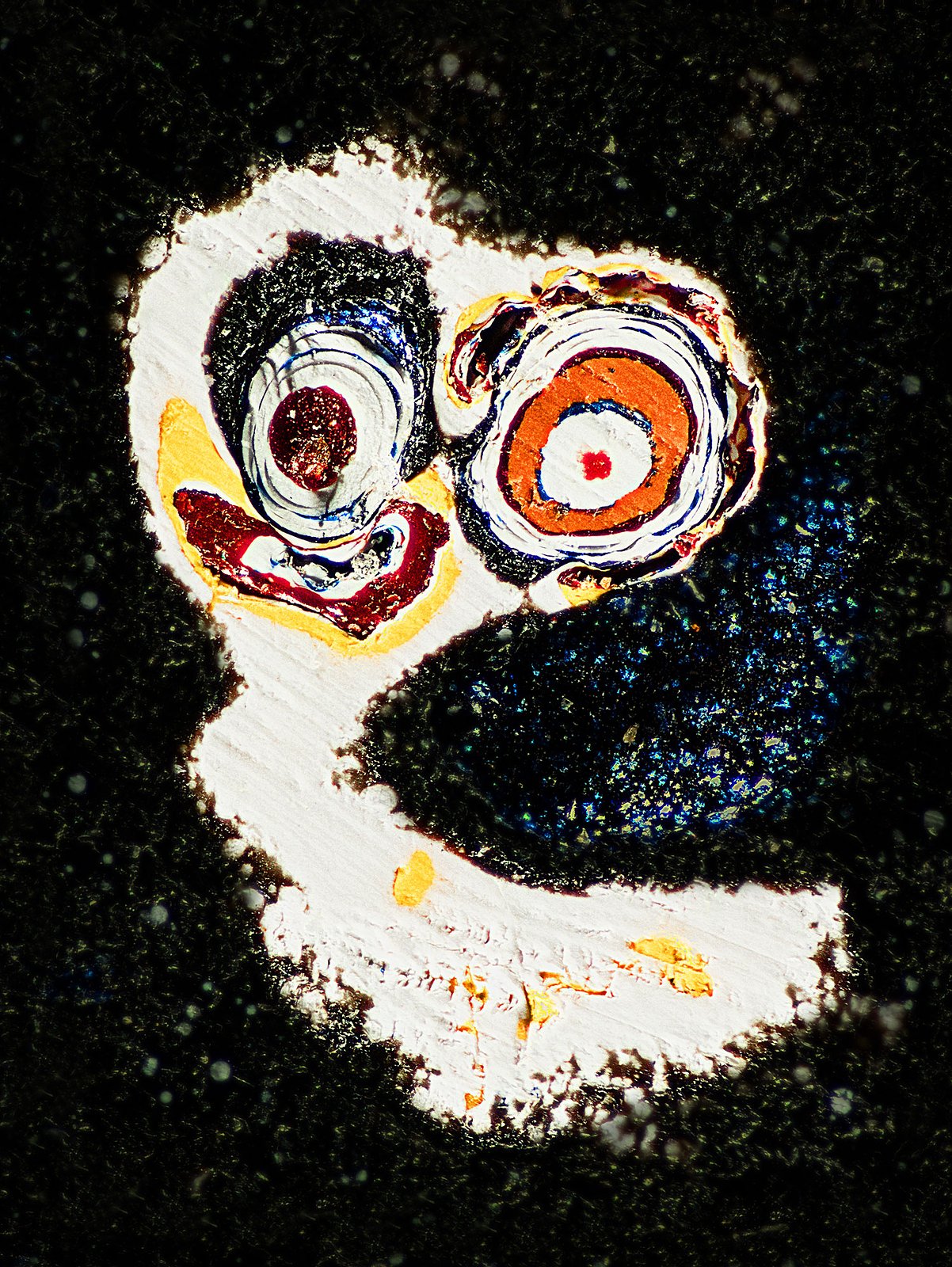Fordite, also known as Motor Agate, is a unique automotive enamel material with an interesting history. The original layered automotive paint slag “rough” was made incidentally, years ago, by the now extinct practice of hand spray-painting multiples of production cars in big automotive factories. 

The oversprayed paint in the painting bays gradually built up on the tracks and skids that the car frames were painted on. Over time, many colorful layers built up there. These layers were hardened repeatedly in the ovens that the car bodies went into to cure the paint. Some of these deeper layers were even baked 100 times. 

Eventually, the paint build-up would become obstructing, or too thick and heavy, and had to be removed. As the story goes, some crafty workers with an eye for beauty realized that this unique byproduct was worth salvaging. It was super-cured, patterned like psychedelic agate, and could be cut and polished with relative ease! 