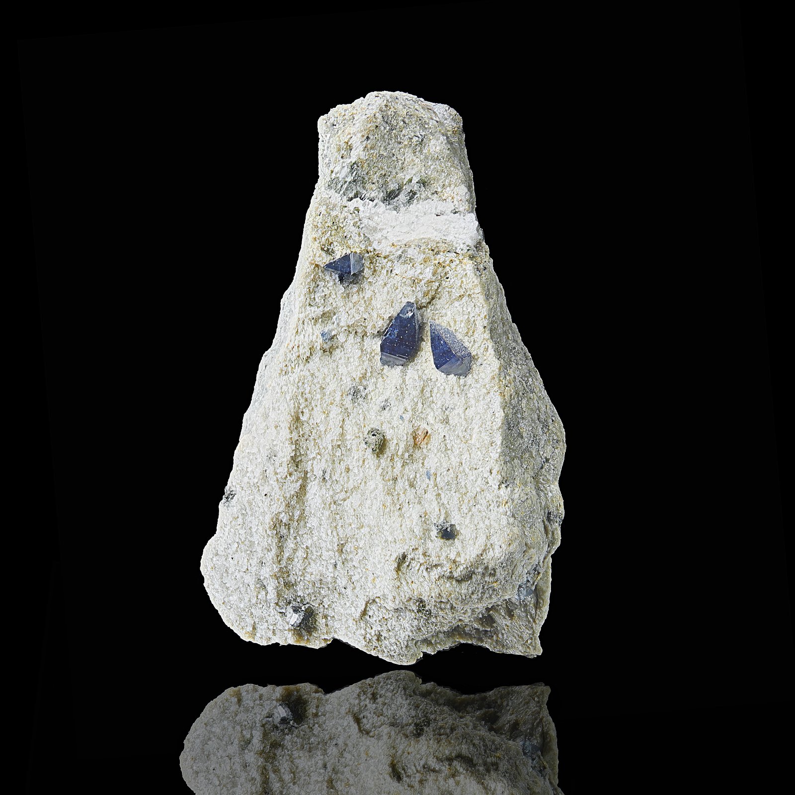 Blue Anatase crystals on a light colored host rock from Kline's Quarry, Pennsylvania. 