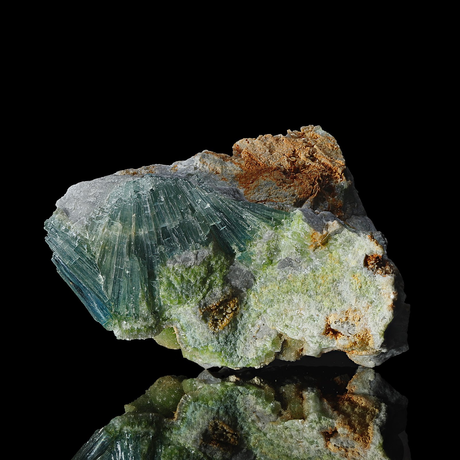 Wavellite is a classic radiating mineral, forming spectacular pinwheel aggregates emanating from a central core in spherulitic balls. When the balls are complete, the radial structure is internal and not usually visible. A crystal aggregate needs to be fractured to see and appreciate the outstanding radial habit of Wavellite. Wavellite was named in 1805 after William Wavell, an English physician who first discovered this mineral.
Variscite is a secondary mineral formed by direct deposition from phosphate-bearing water which has reacted with aluminium-rich rocks in a near-surface environment. It occurs as fine-grained masses in nodules, cavity fillings, and crusts. 